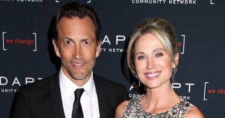 Amy and Holmes were married to other people when they started dating in 2022.