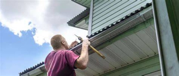 Can I replace my own roof?