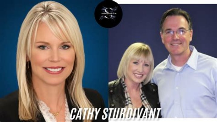 Cathy Sturdivant has a blonde hair as she is smiling for the camera in this picture.