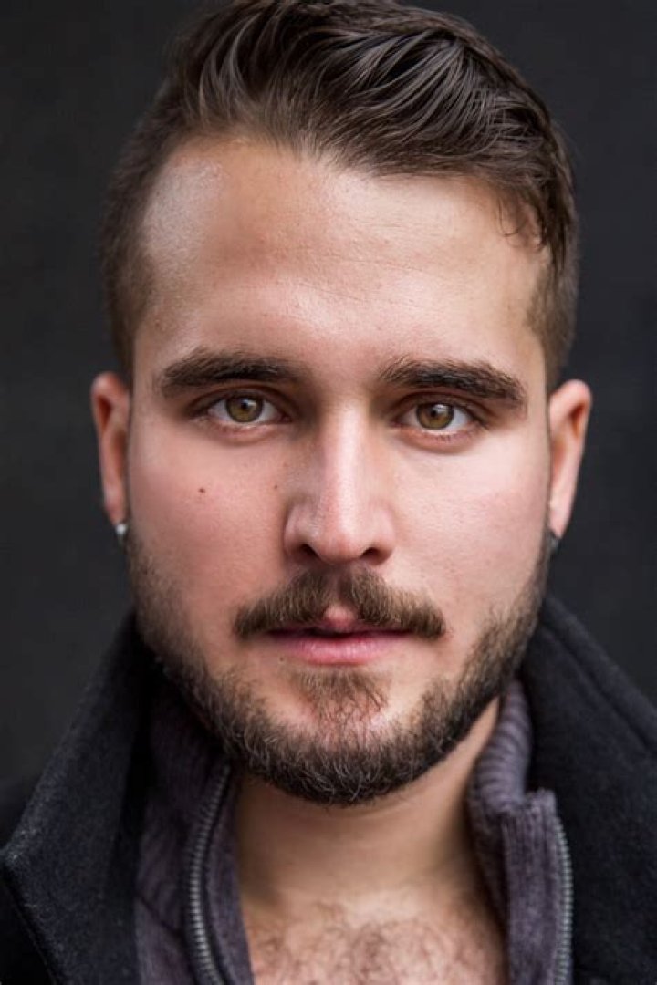 Daniel Samonas posing for a modeling shoot.