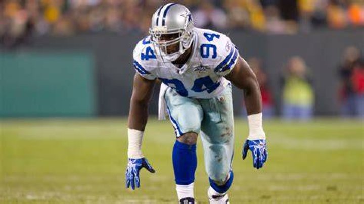 DeMarcus Ware as a defensive end for NFL's Dallas Cowboys.
