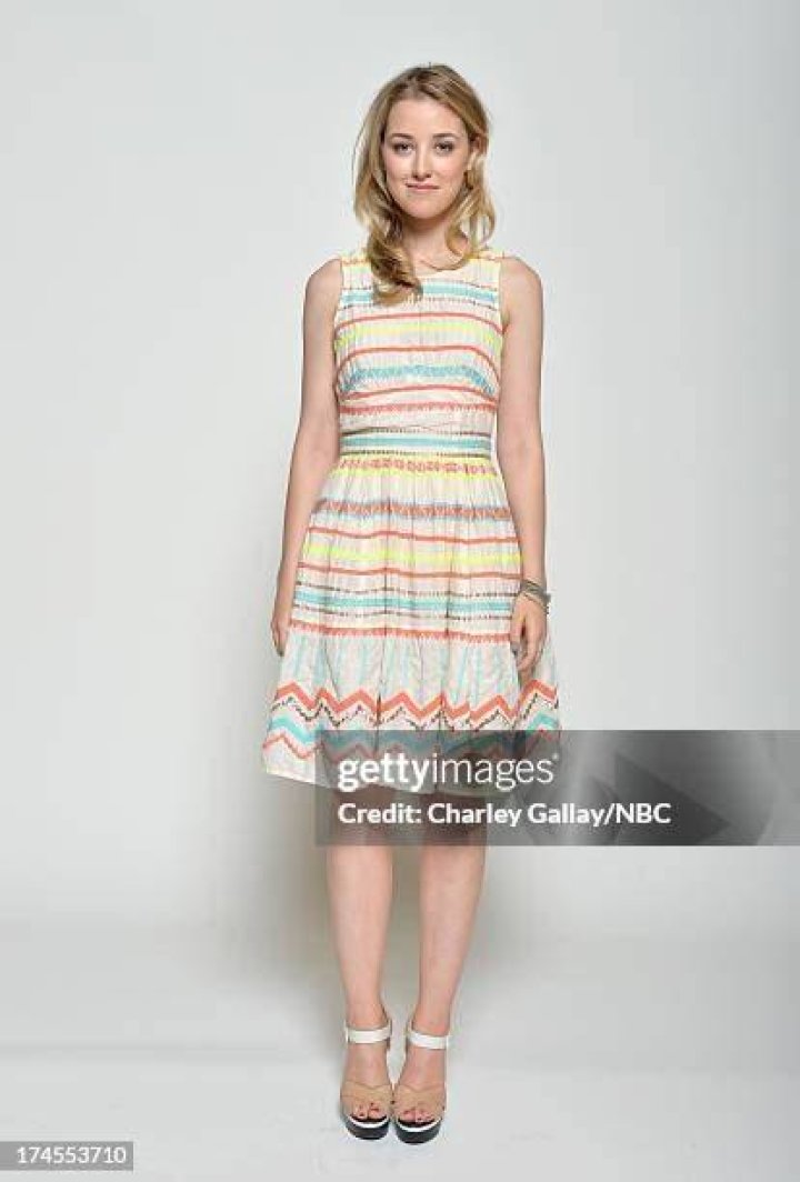 Ella Rae Peck posing for a photoshoot by wearing a mixed color cloth.