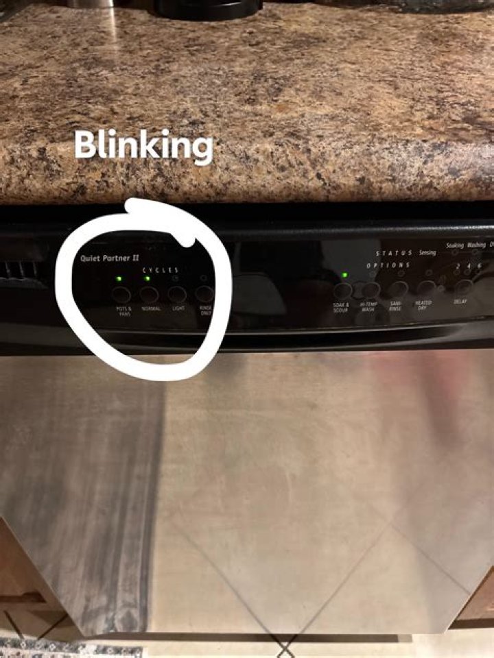 Why is my Whirlpool dishwasher lights blinking?